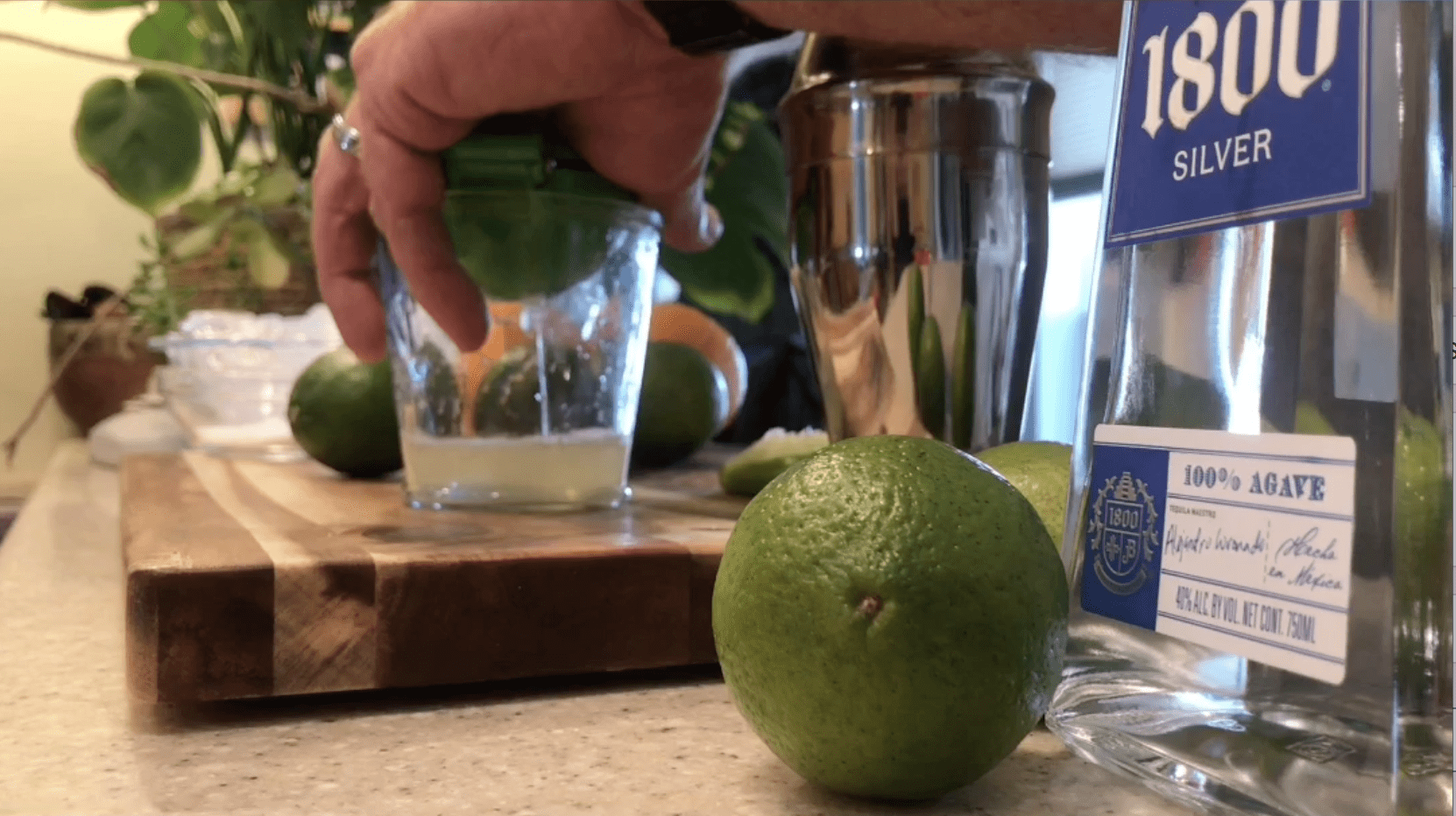 squeezing limes for margarita in mexico